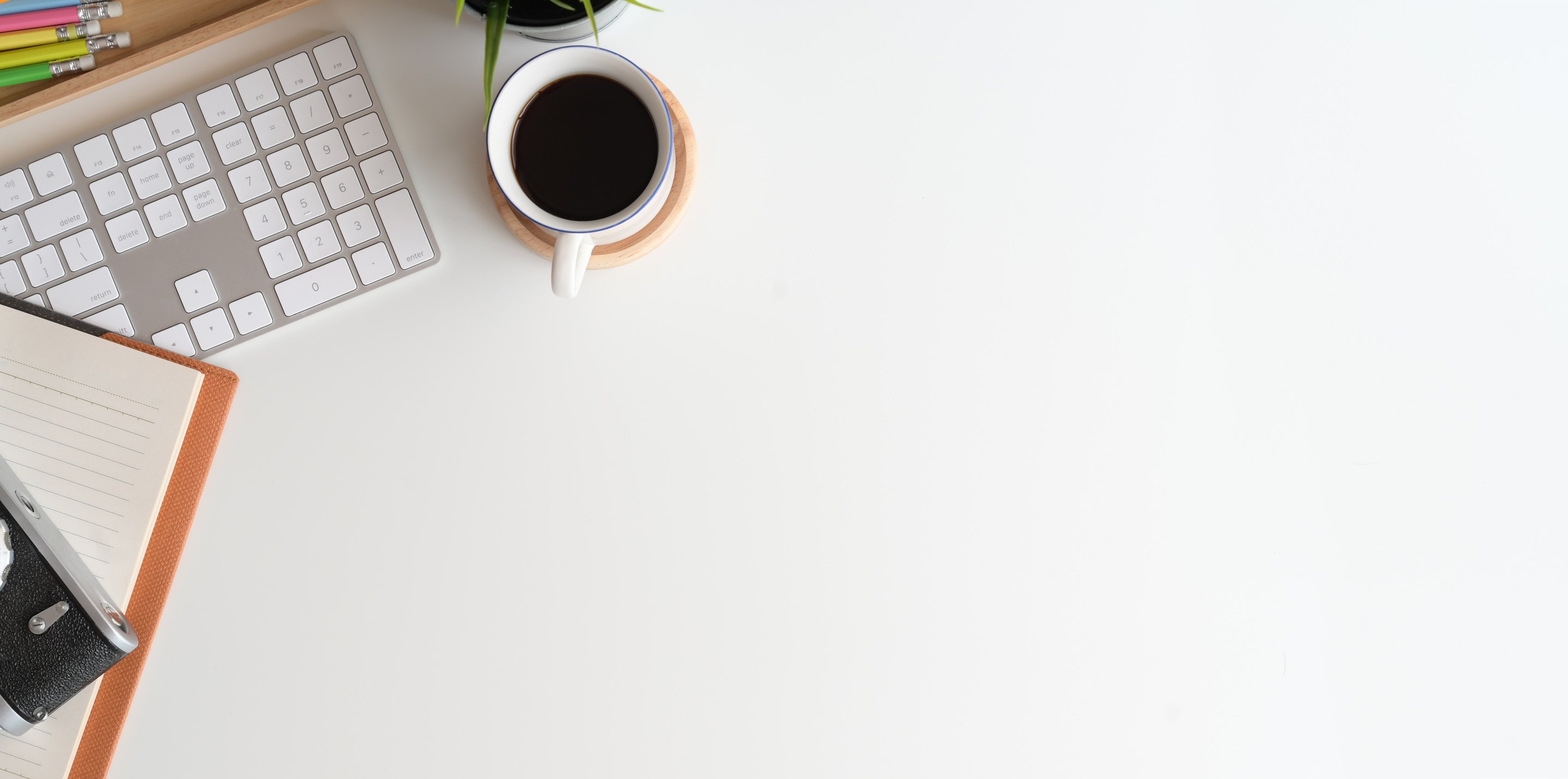 White Ceramic Cup on White Table